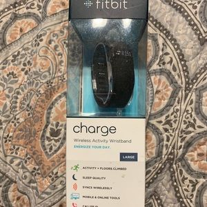 Fit Bit Charge - Never opened. Brand new.